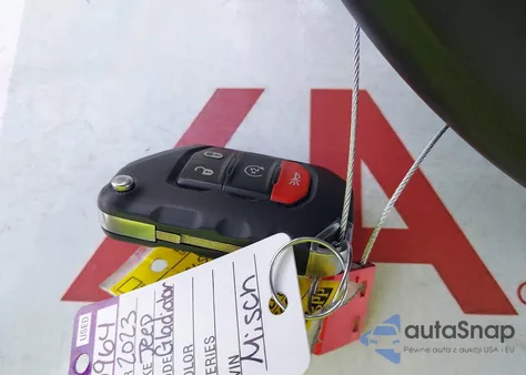 2023 Jeep Gladiator Sport S 4X4 z USA, uszkodzony, nr VIN 1C6HJTAGXPL528965